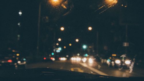 Close-up of illuminated lights at night