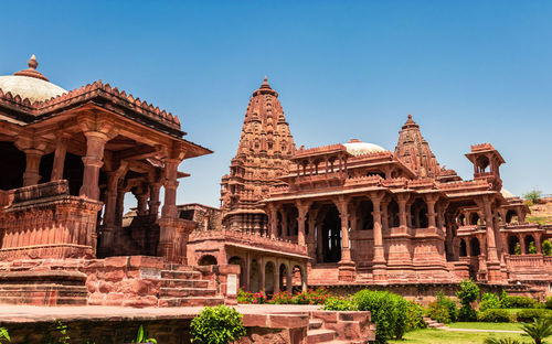 Ancient temple architecture with bright blue sky at morning