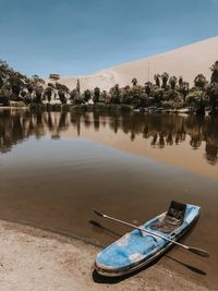 Scenic view of lake in desert sky