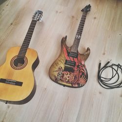 High angle view of guitar on hardwood floor