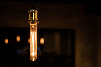 Close-up of illuminated light bulb