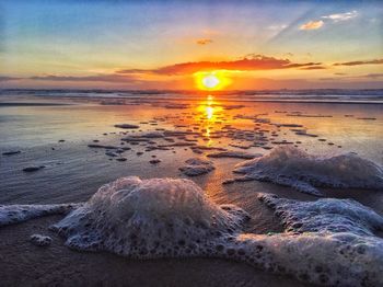 Scenic view of beach during sunset