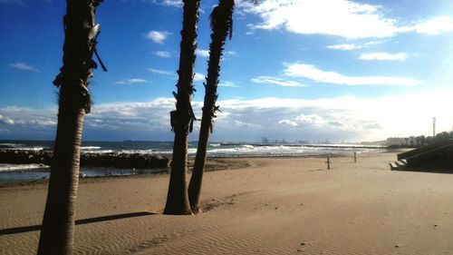 Scenic view of beach against sky