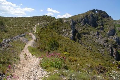 Hiking trail to la forada rock arch, sierra de la forada, alicante province, spain 