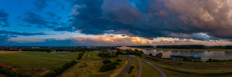 Panoramic view of road against sky during sunset