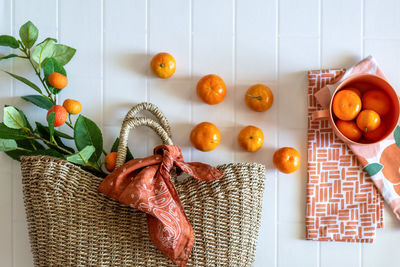 Directly above shot of orange fruits on table at home