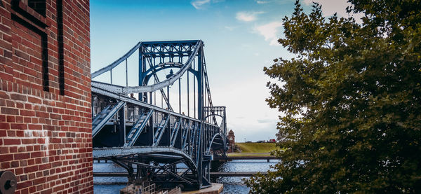 Bridge over river against sky