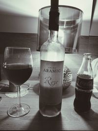 Close-up of wine glasses on table