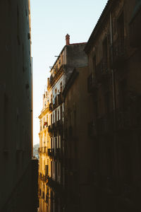 Buildings against clear sky