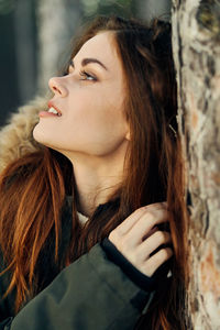 Portrait of beautiful woman looking away