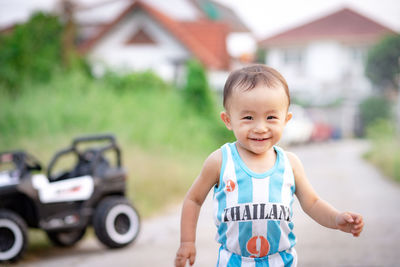 Portrait of cute boy outdoors