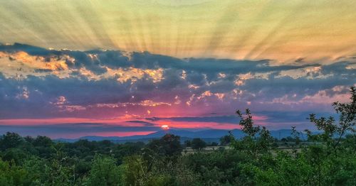 Scenic view of dramatic sky during sunset