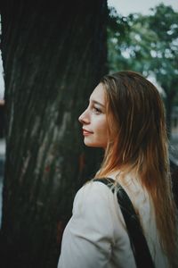 Portrait of beautiful woman in forest