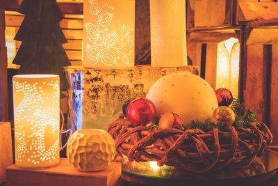 Close-up of christmas decoration on table at home