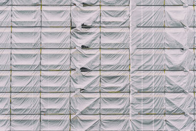 Full frame shot of tarpaulin on scaffolding