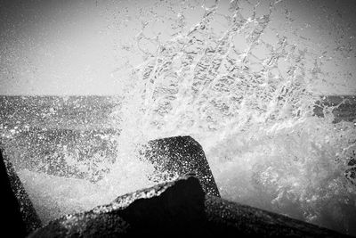 Waves splashing on rocks