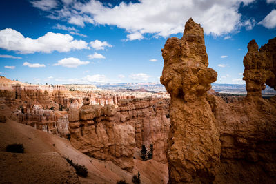 Panoramic view of rock formations against sky