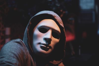 Close-up portrait of man wearing mask