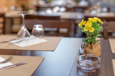 Close-up of flower vase on table