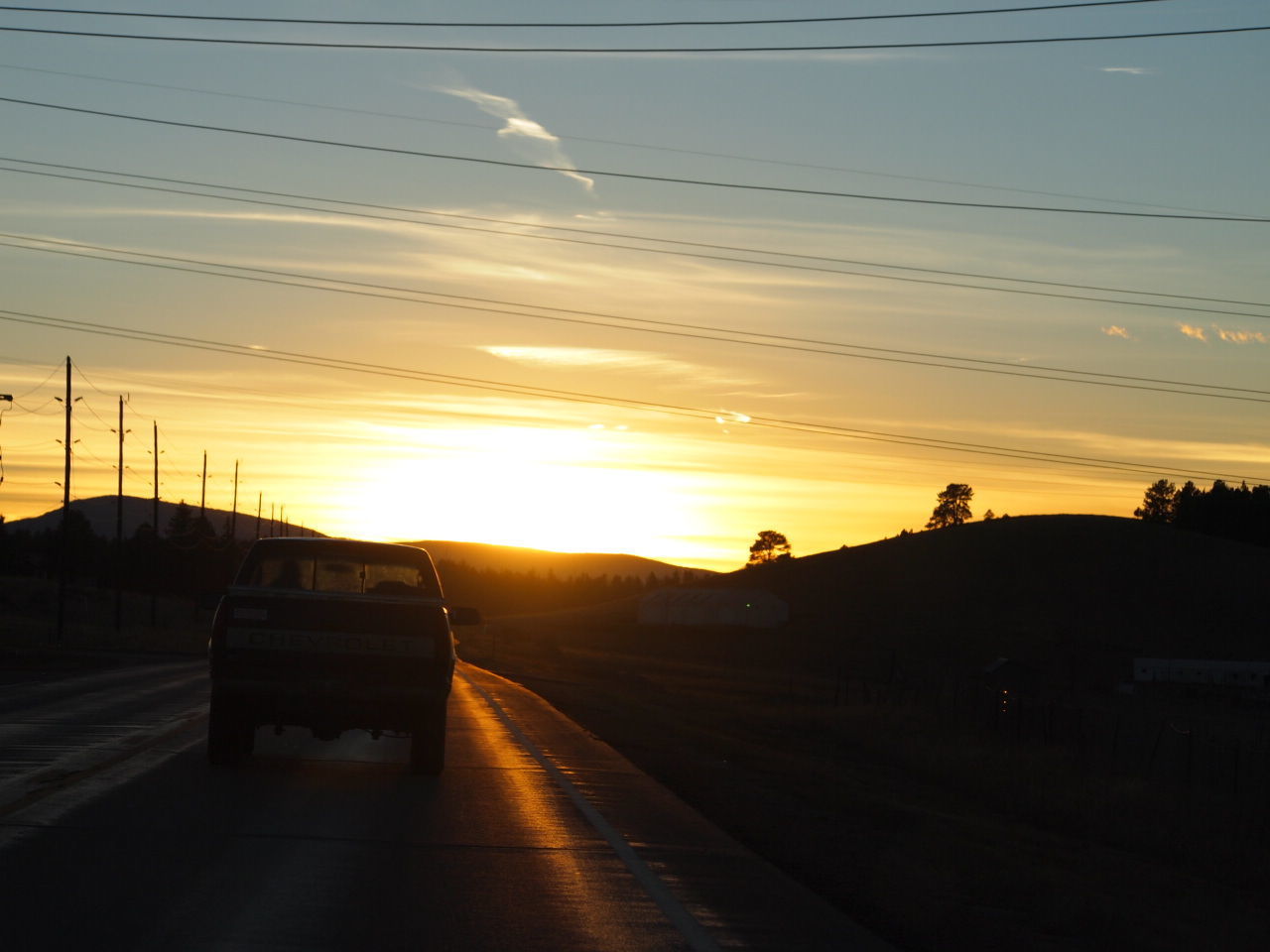 SILHOUETTE ROAD AGAINST SKY AT SUNSET