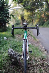 Bicycle parked on field