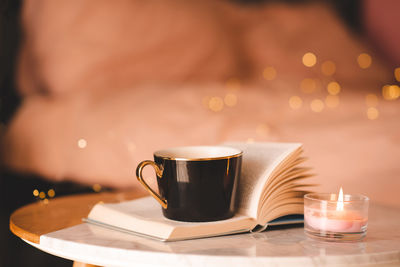 Close-up of coffee cup on table