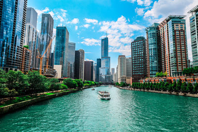 Trump international hotel & tower - chicago by chicago river against sky