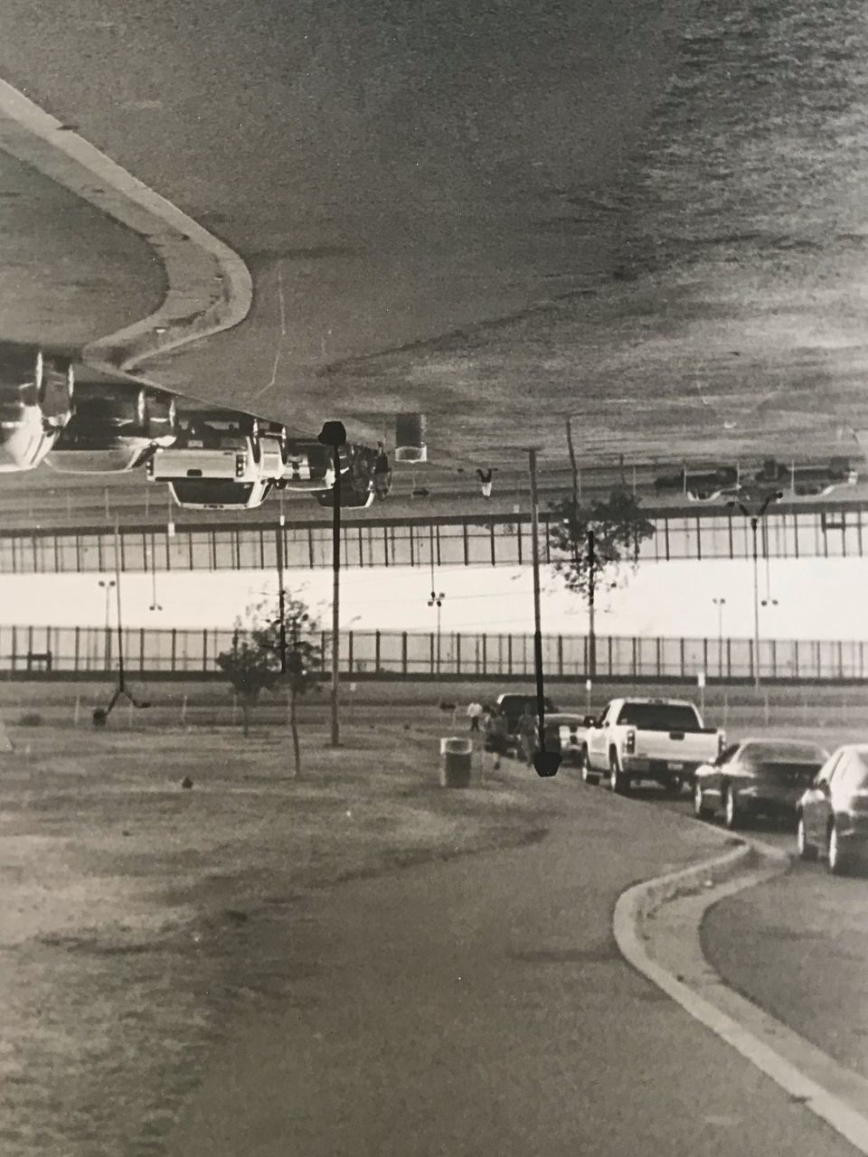 HIGH ANGLE VIEW OF CARS ON ROAD