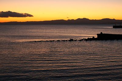 Scenic view of sea at sunset