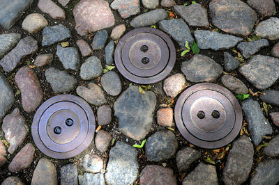 High angle view of stone on cobblestone street