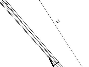 Low angle view of cables against clear sky