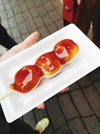 Close-up of hand holding food