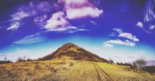 Scenic view of land against sky