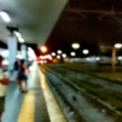 Defocused image of illuminated road at night
