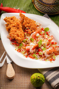 High angle view of food in plate on table