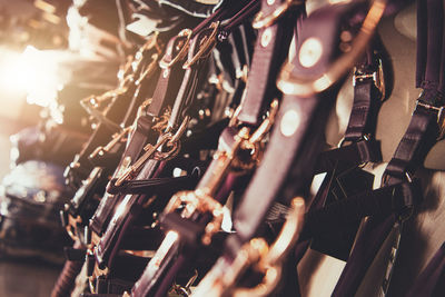 High angle view of clothes hanging on metal for sale