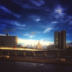 View of city against cloudy sky