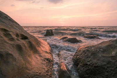 Scenic view of sea against sky during sunset