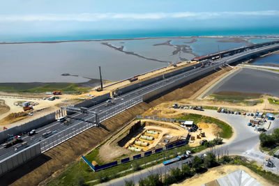 High angle view of highway in city against sky