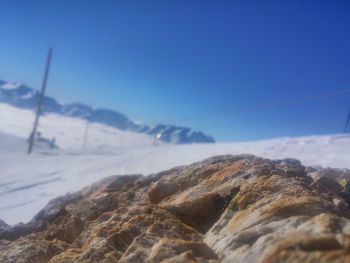 Scenic view of snow covered mountains