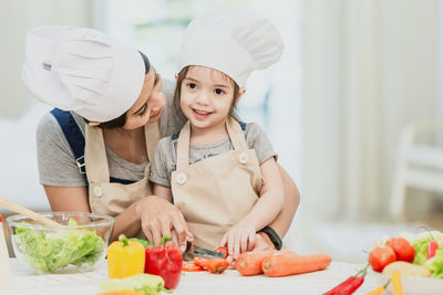 Portrait of a girl preparing food