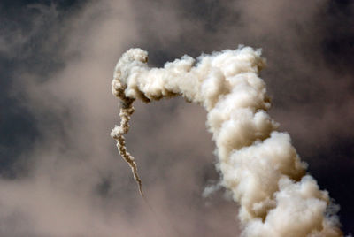 Trail of smoke from shuttle launch