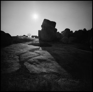 Rock formations on landscape against clear sky