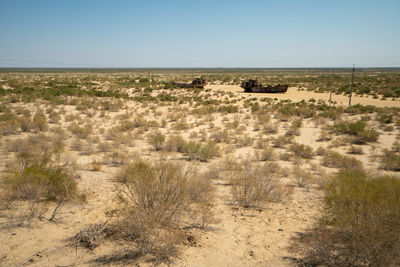 Rusty ship wreck in the deserted aral sea near muynak en uzbekistan