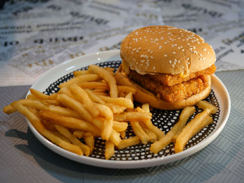 Close-up of burger in plate on table