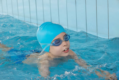 Close-up of swimming in pool