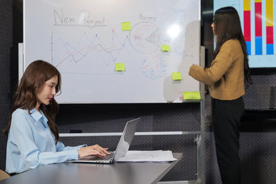 Businesswoman working in office