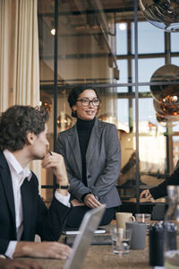 Business colleagues working in office