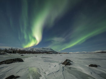 Scenic view of sea against sky at night