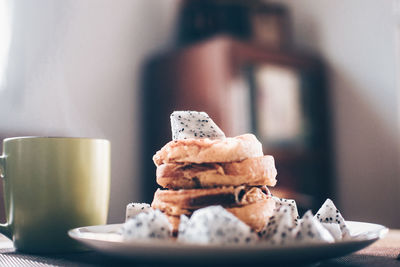 Close-up of cake in plate on table